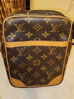 pre-owned Louis Vuitton Danube cross-body bag featuring the brand's iconic mono